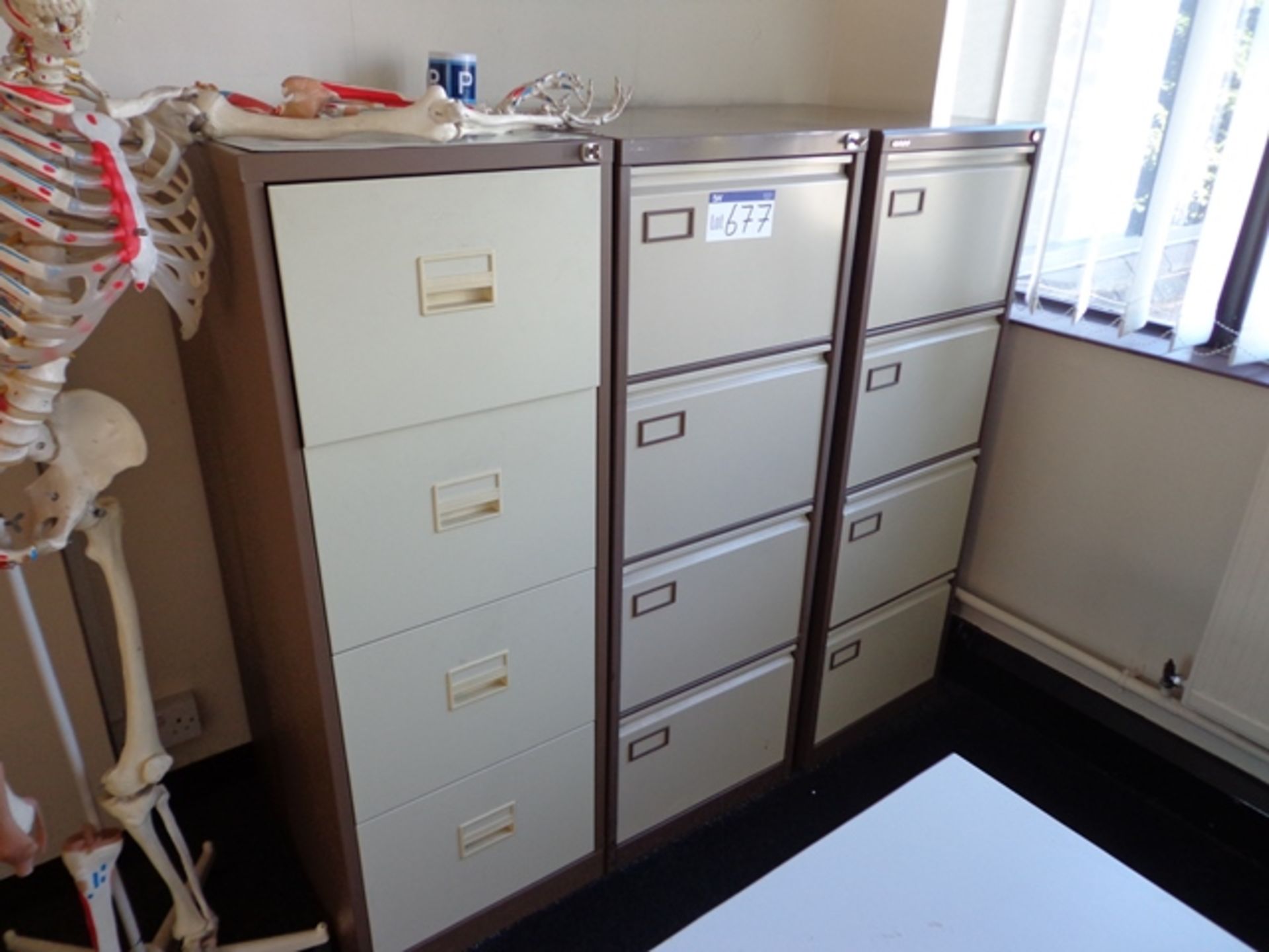 Three 4 Drawer Filing Cabinets