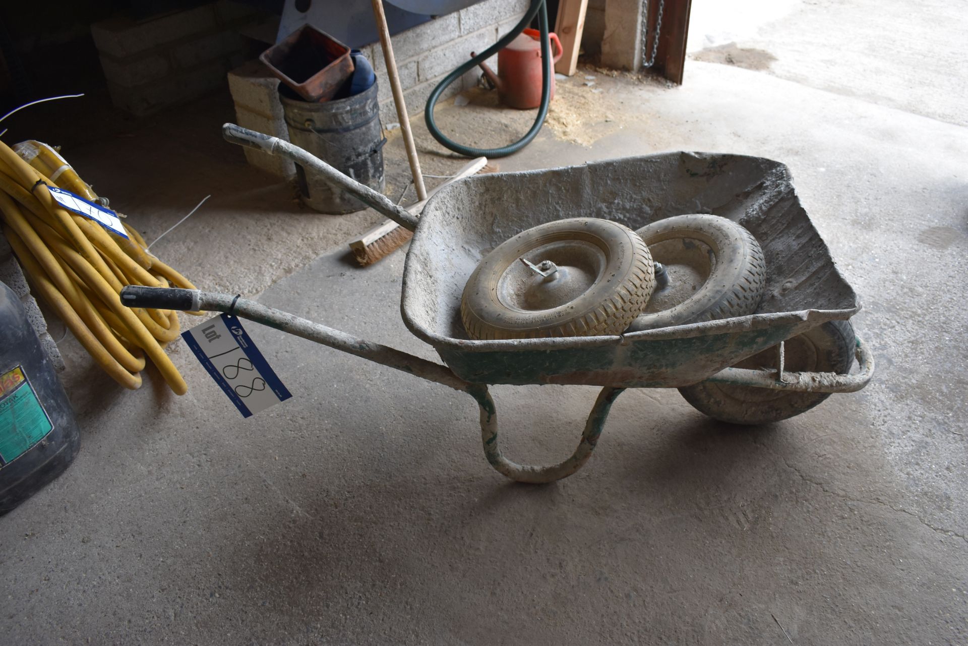 Wheelbarrow, c/w two spare wheels