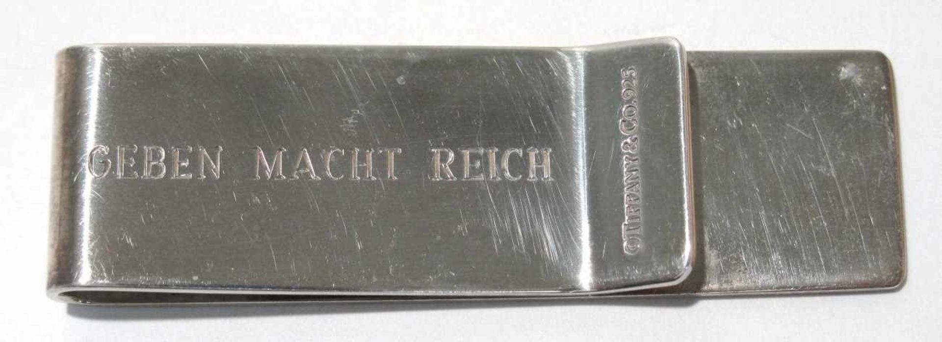 Geldklammer Tiffany & Co. Silber, Marken (925, T&CO). Graviert "Geben macht reich", u.a. L. 6 cm.