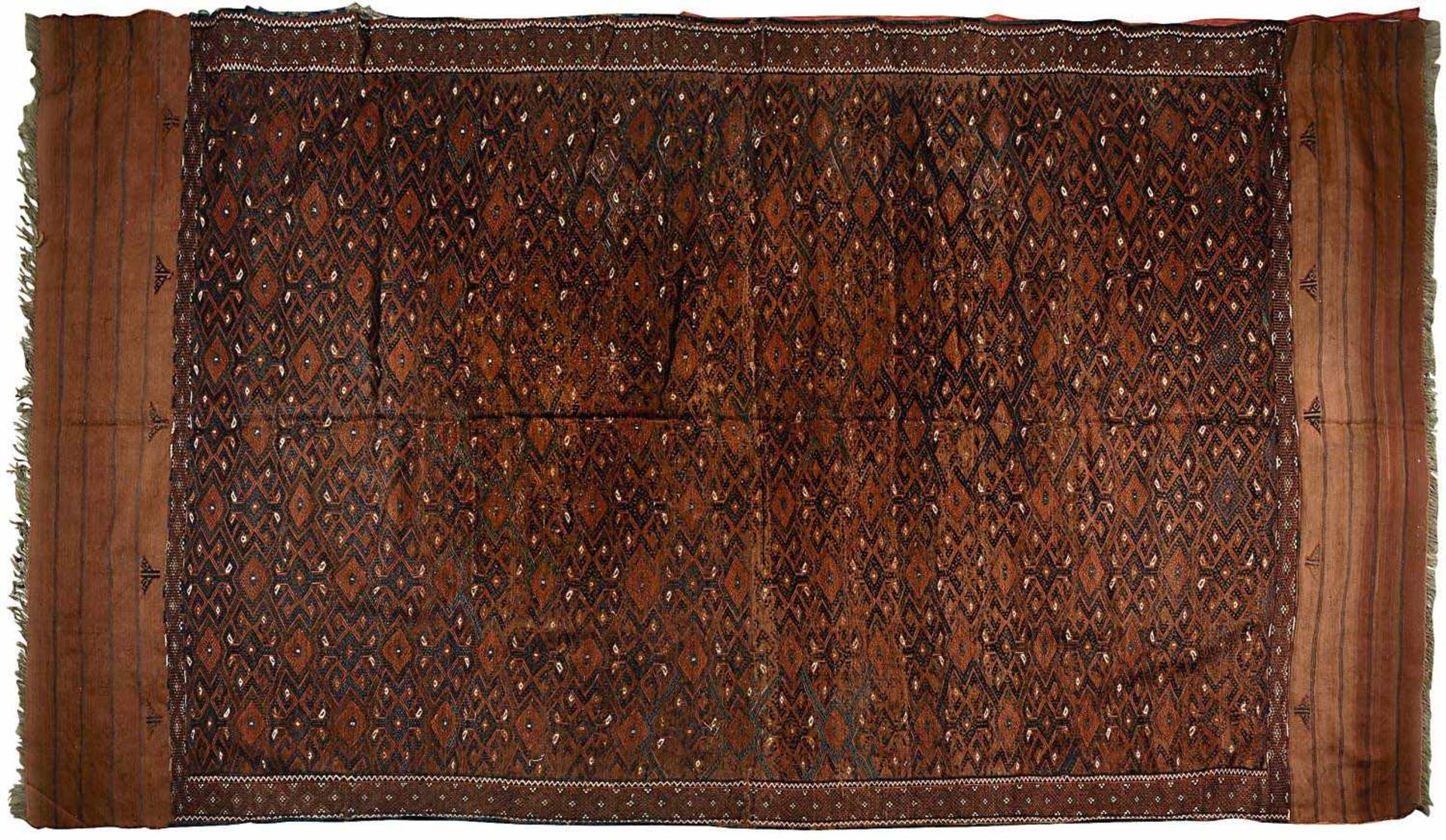 Turkmenisches Flachgewebe 2. Hälfte 19. Jh. Gebrauchsspuren, besch., rest. 309 x 180 cm Lt.