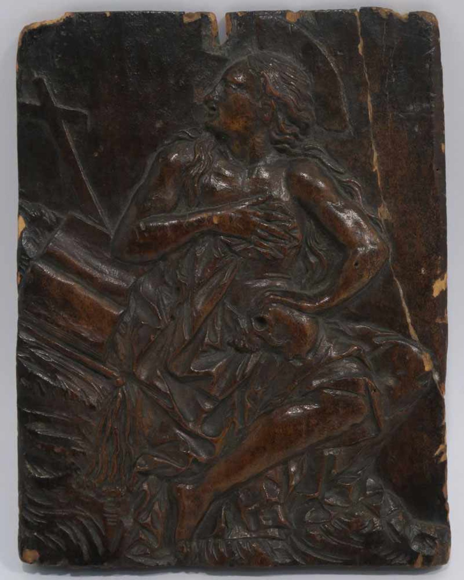 ReliefBüßende Maria Magdalena. Holz, dunkel gebeizt. Besch., rep. 19,5 x 15 cm.