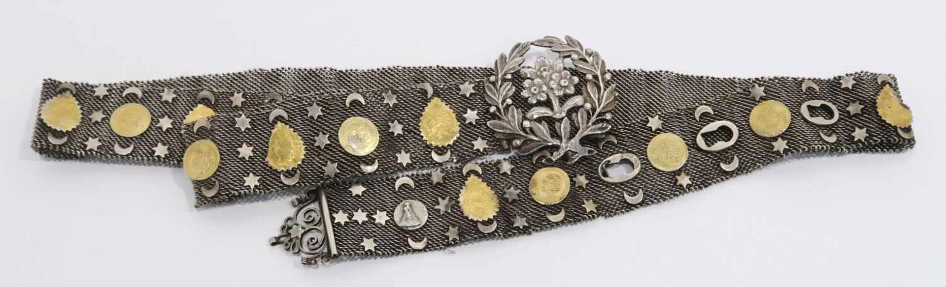 GürtelOsmanisch. Silber. Floral durchbrochene Schließe, Silbergeflechtband mit applizierten