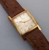 Zenith-HerrenarmbanduhrSchweiz, 2. H. 20. Jh.Rechteckiges Gehäuse mit cremefarbenem Zifferblatt,