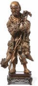 Der Unsterbliche Li Tieguai (Li T'ieh-kuai)ChinaWurzelholz, geschnitzt. H. 64 cm, auf Holzsockel