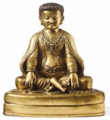 Figur des sitzenden Buddha (?)Tibet, 19. Jh.Auf Sockel sitzend mit lässig übereinander