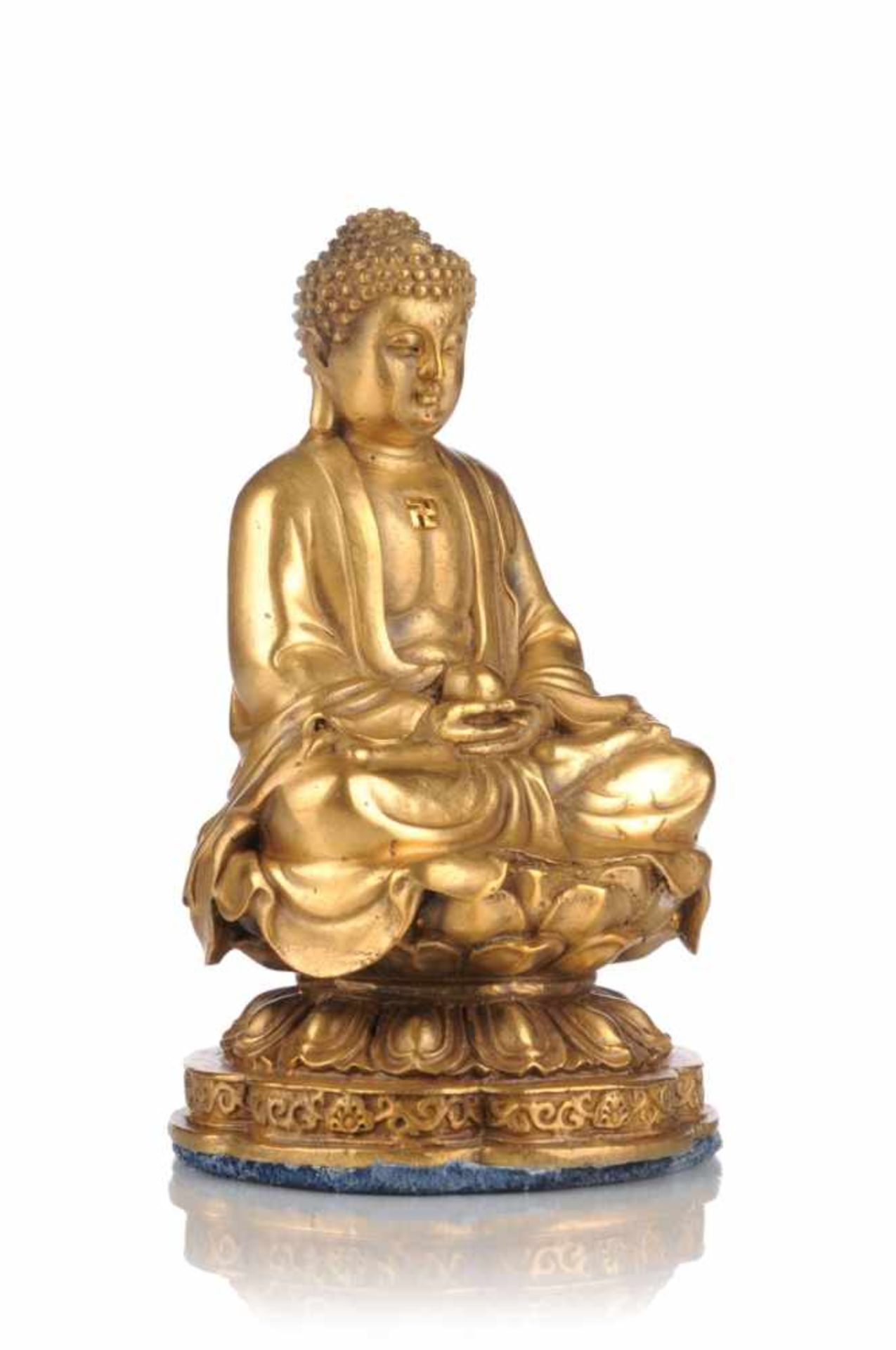Kleiner Buddha auf Lotussockel. 19./20. Jh.Gelbguss, hohl gearbeitet. Sitzender Buddha auf
