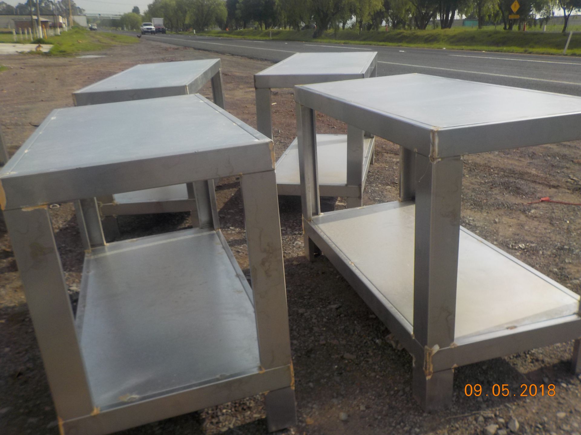 Lot of 4 SS tables with approximate measurements: