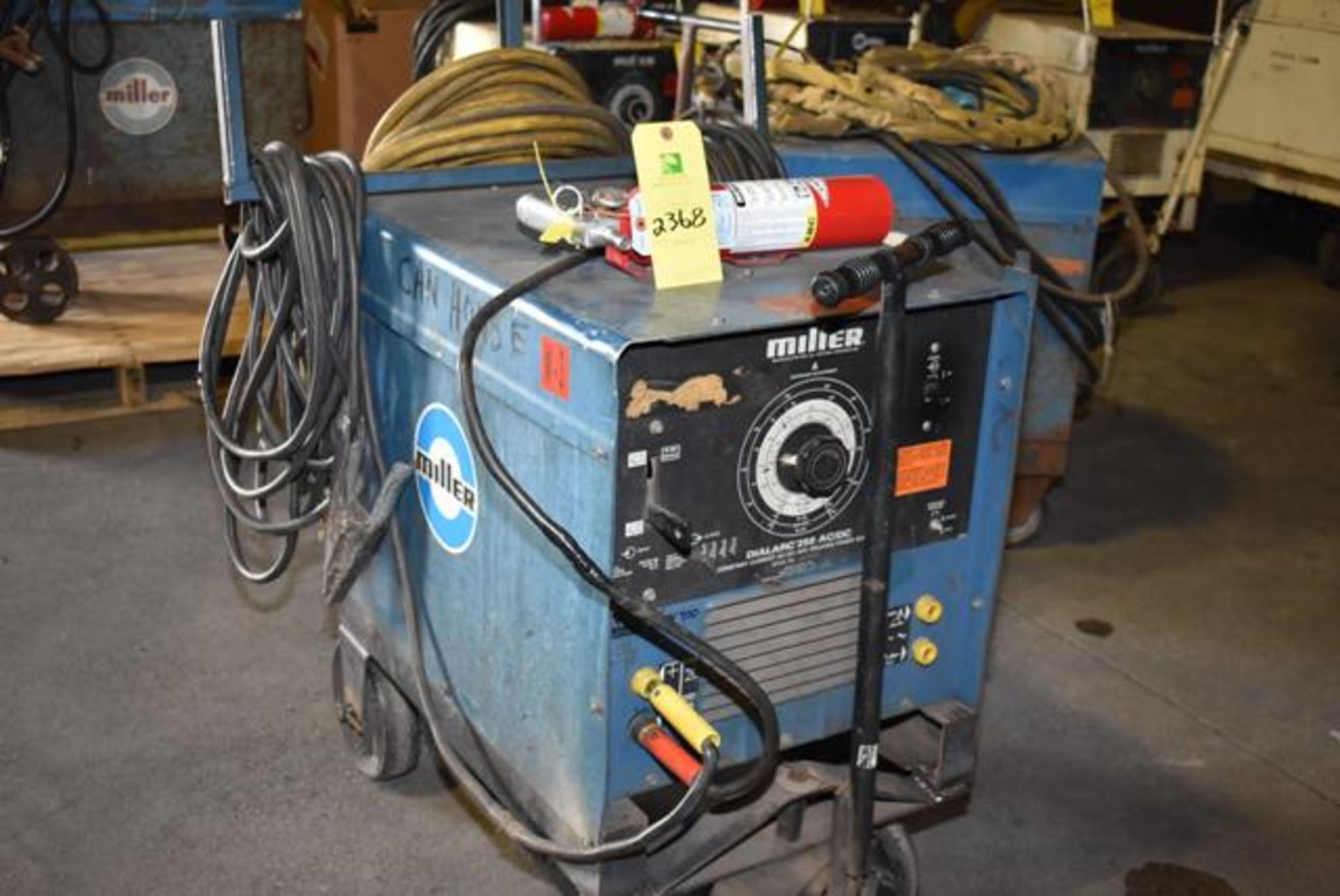 Miller Dialarc 250-AC Welder, Cables, 4-Wheel Base, SN JE756625, RIGGING FEE: $50