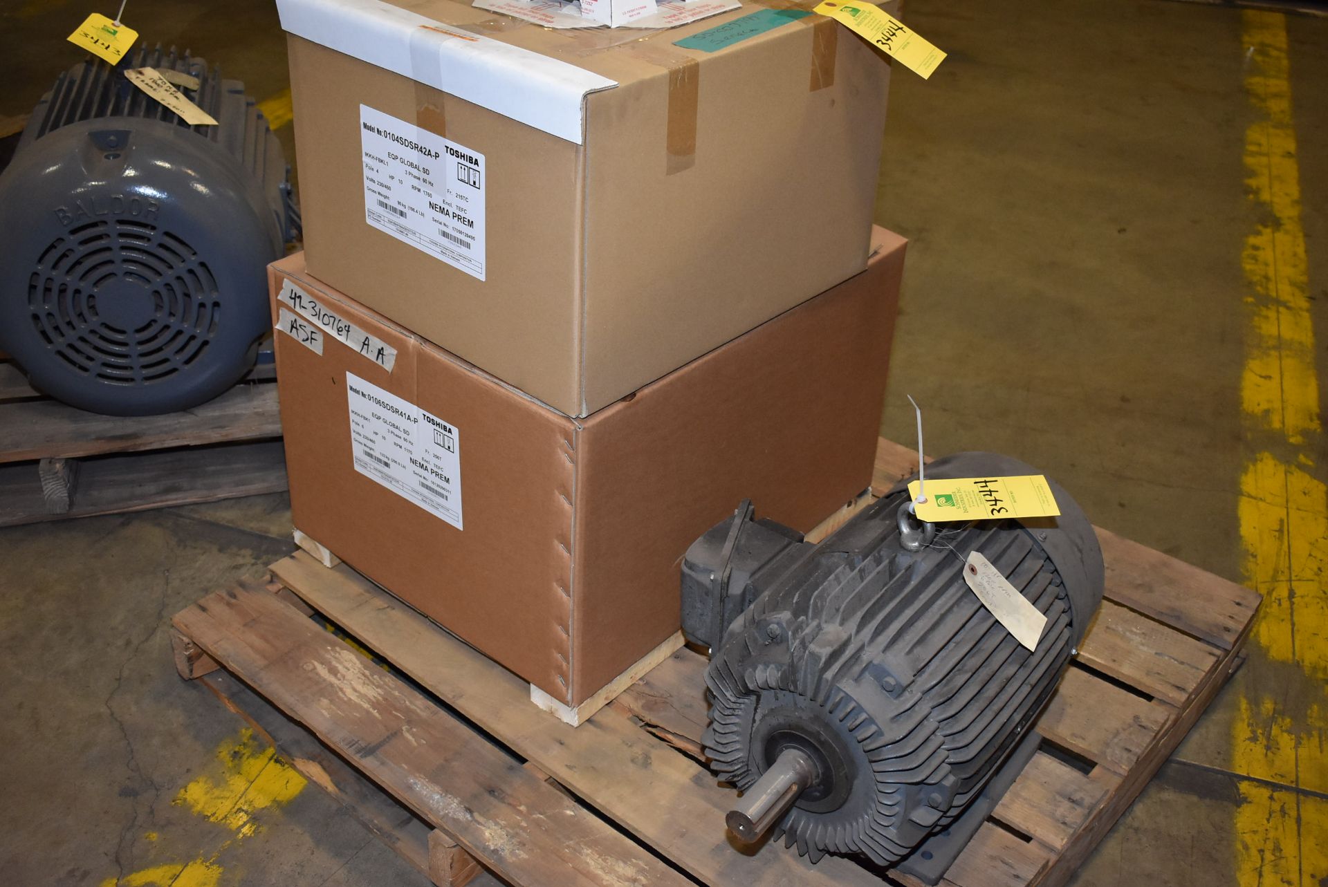 Pallet - (2) Toshiba 10 HP Motors, (1) 10 HP Motor, RIGGING FEE: $50