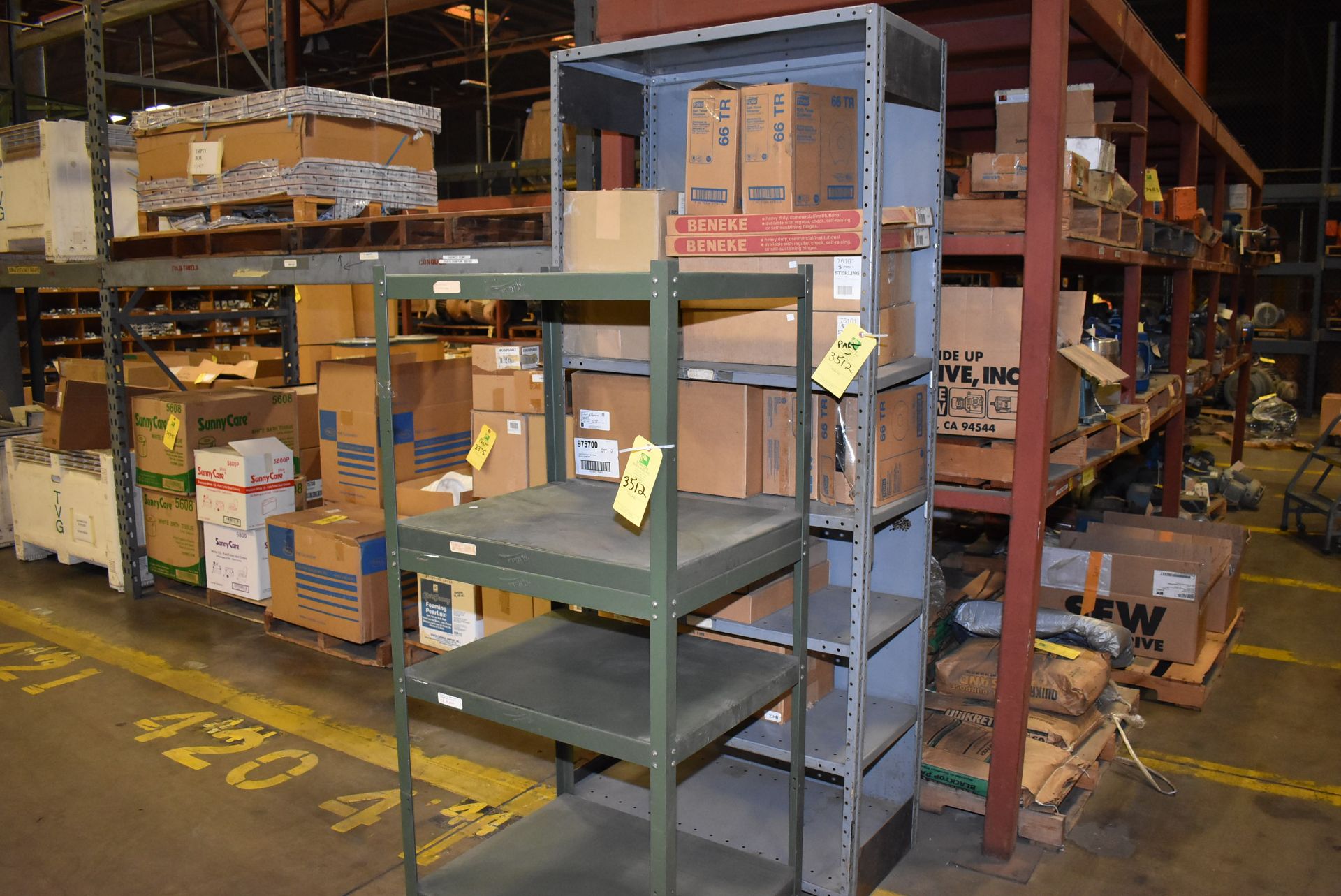 (2) Steel Shelf Units w/Contents, Beneke Products, York Dispenser, RIGGING FEE: $50