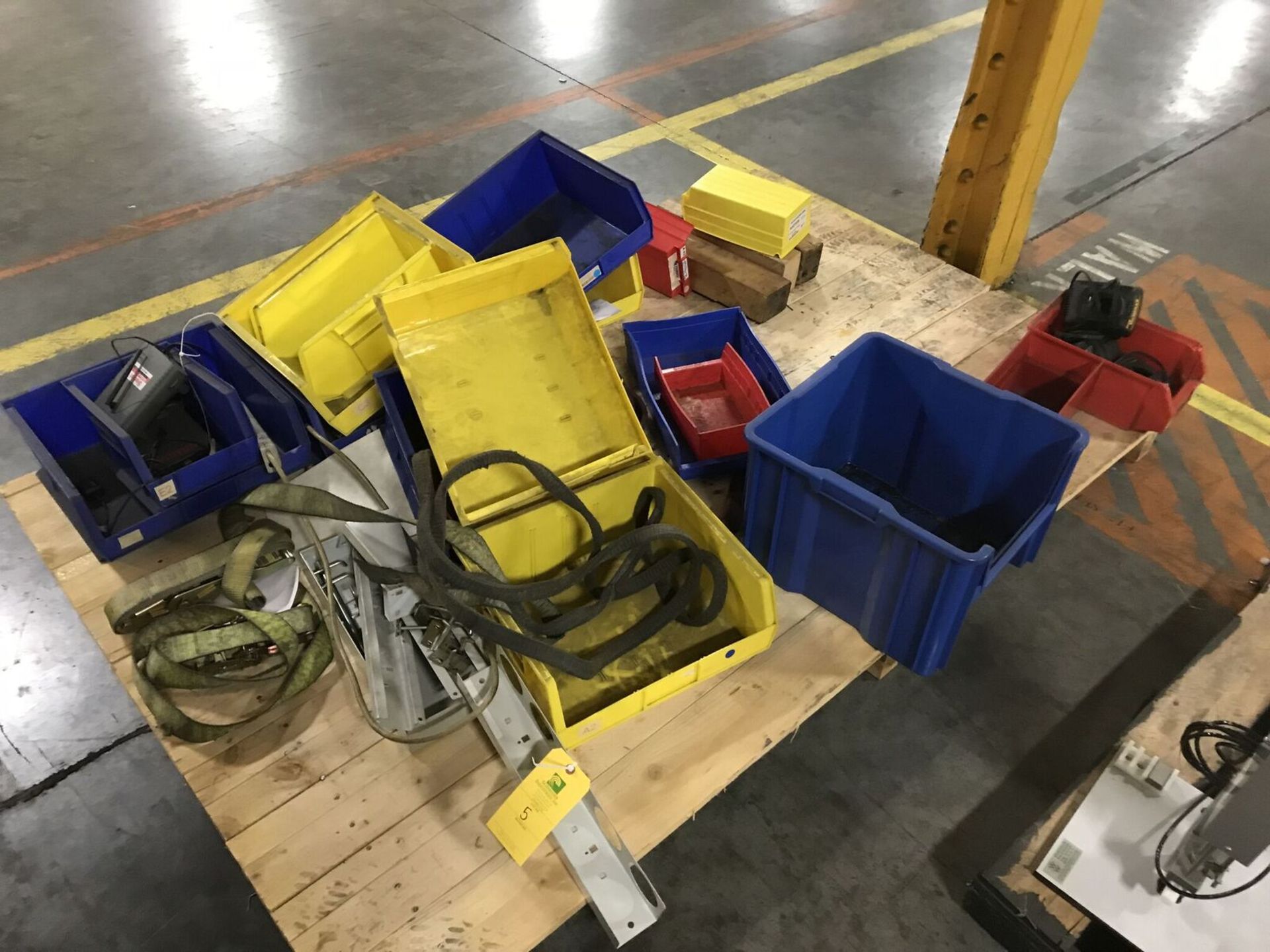 Pallet of red, yellow and blue containers Rigging Fee $15