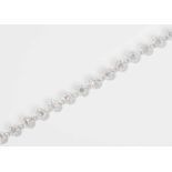 Diamant-Bracelet 750 Weissgold. Rivière aus 40 Diamant-Baguetten und 180 Brillanten zus. ca. 3 ct. L