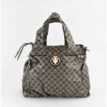 Gucci, Tasche "Hysteria"Aus beschichtetem Guccissima-Stoff in Beige und Dunkelblau. Zwei Henkel.