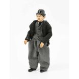 Bucherer-SABA-Figur "Charlie Chaplin"Schweiz, um 1925. Kugelgelenkpuppe aus Metall. Kopf, Hände