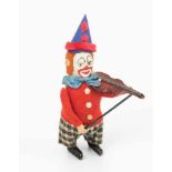 Schuco-Tanzfigur "Clown als Violinspieler"Deutschland, 1930er Jahre. Fussprägung "SCHUCO PATENT"