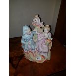 A Porcelain figural group