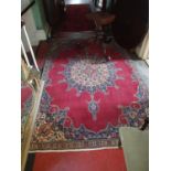 An old Red ground Persian Marchant Carpet chef Saffy design