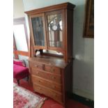 An Arts and Crafts Dresser with a glazed stained glass upper section