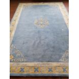 A large Asian Blue ground Rug 366 cm x 244 cm.