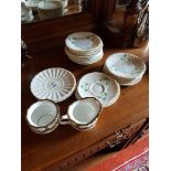 A quantity of Beleek Saucers and Plates: various dates