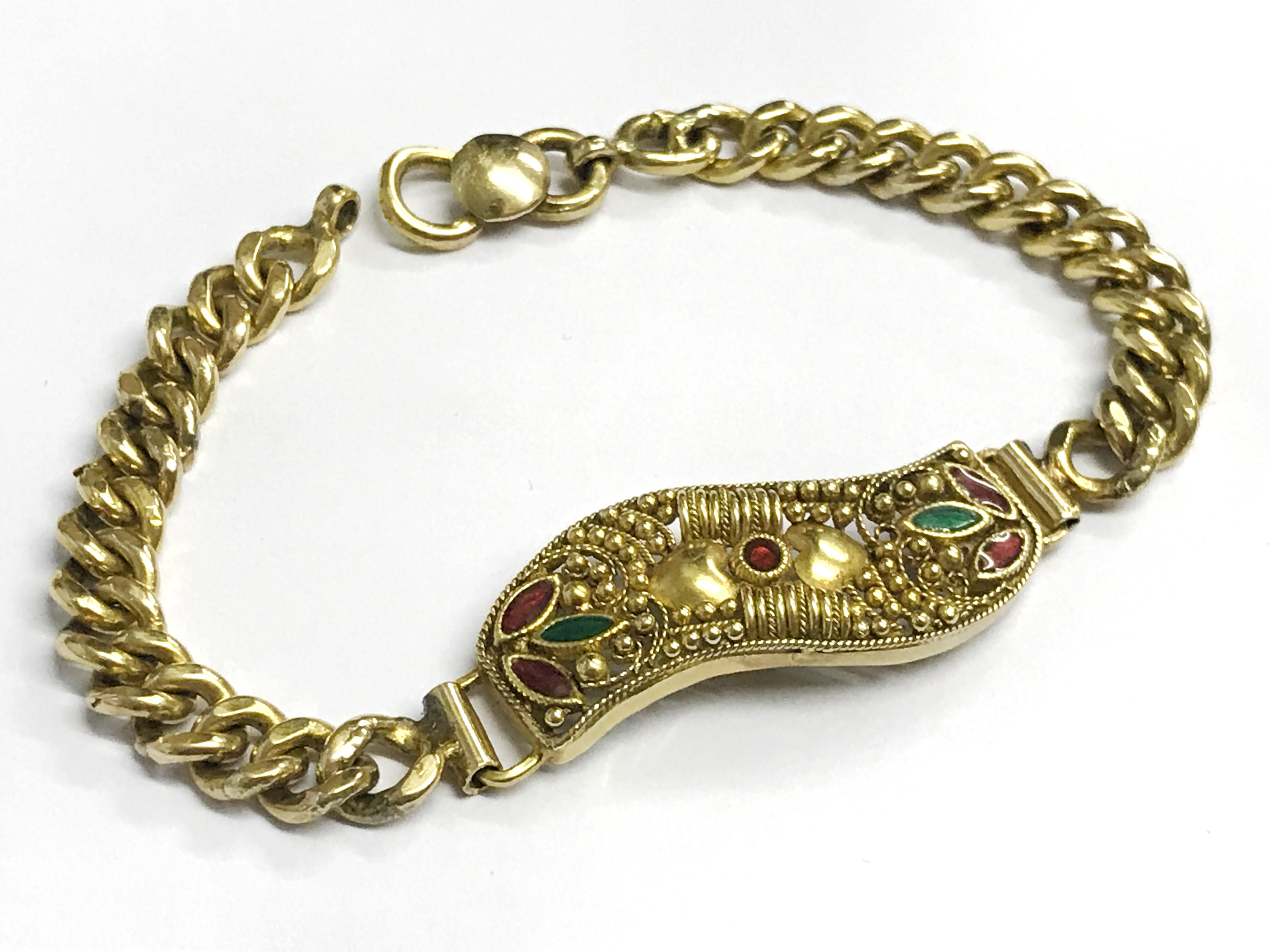 HIGH CARAT GOLD AND GEMSTONE BRACELET