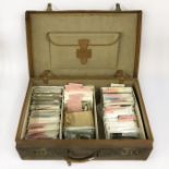 COLLECTION OF POSTCARDS IN A SUITCASE