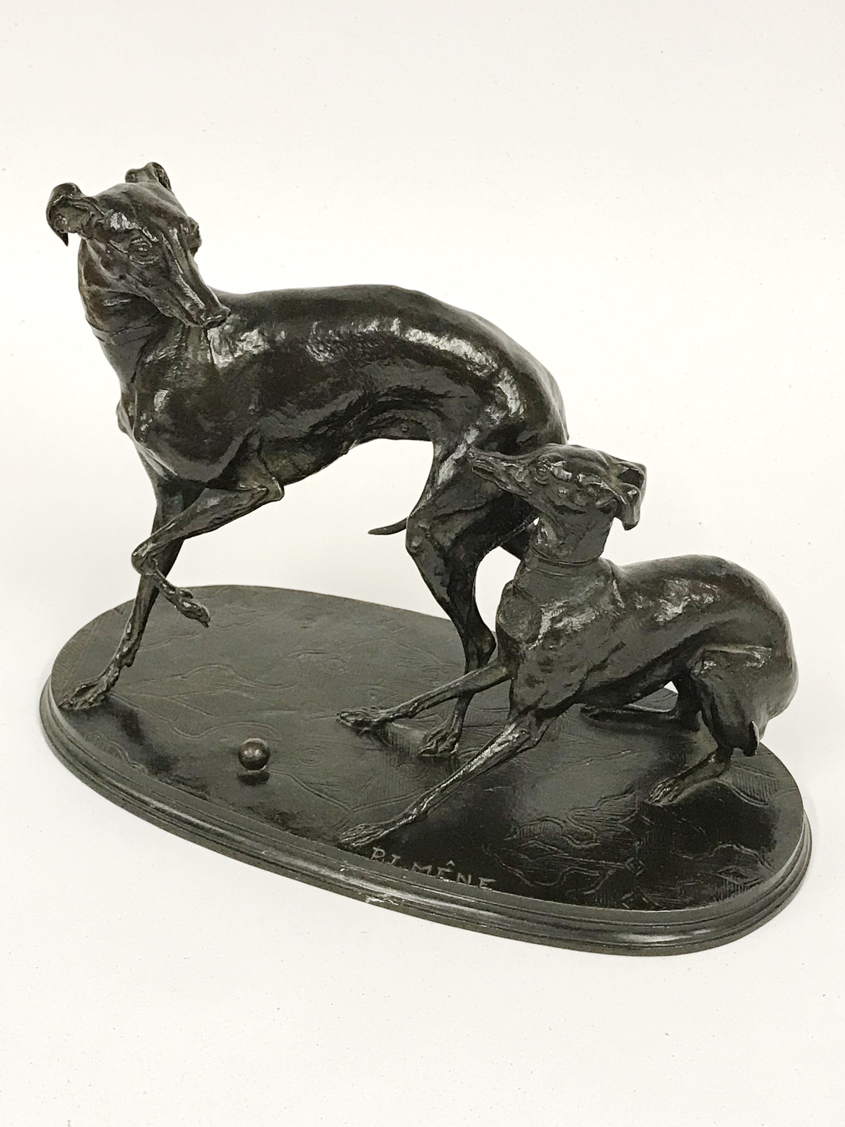 BRONZE FIGURINE - TWO WHIPPETS ON OVAL BASE SIGNED PJ MENE