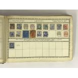 OLD POSTAGE STAMP ALBUM