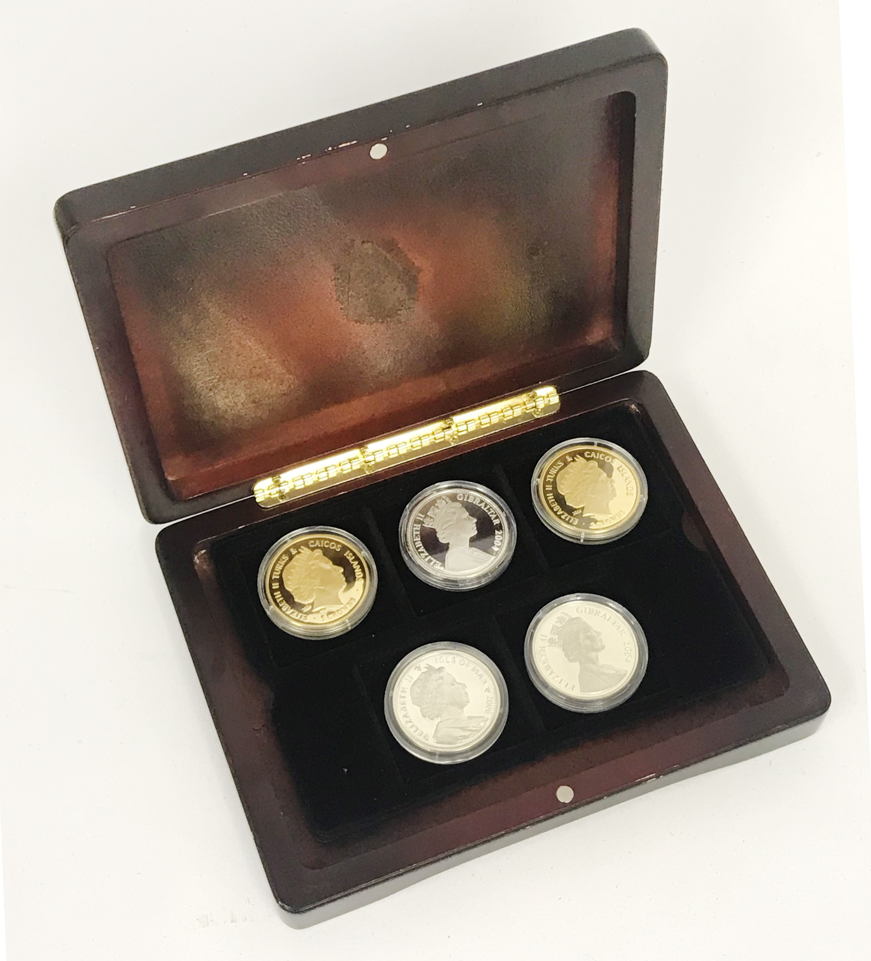 FIVE CASED SILVER COLLECTORS COINS