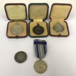 FOUR SILVER MEDALS - LIFE SAVING SOCIETY AWARD OF MERIT & ONE BRONZE MEDAL