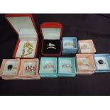 A selection of costume jewellery dress rings stamped 14K of various designs and a bracelet stamped