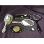 A plated hand brush and mirror, ebony hand mirror etc