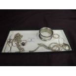 A small selection of white metal jewellery including hematite ring, chain, locket etc