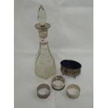 A small cut glass decanter of hexagonal form with silver collar, London 1920, Wolfsky & Co Ltd,