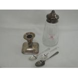 A small selection of HM silver including small candle stick glass sugar caster with silver lid and