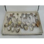 A vintage Rowntrees box containing a selection of HM silver souvenir spoons, approx 320g