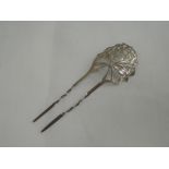 An Edwardian silver hair comb having pierced and engraved blossom decoration, Chester 1905,