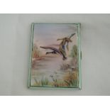 A silver cigarette case having an enamelled panel to front depicting Mallard ducks in flight