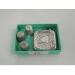 Three HM silver thimbles of traditional form and an Edwardian silver vesta having engraved foliate