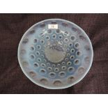 A Rene Lalique opalescent glass dish in the Aster pattern signed R Lalique