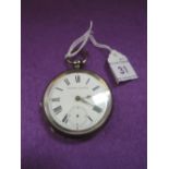 A silver key wound pocket watch by Kendal & Dent having Roman numeral dial with subsidiary