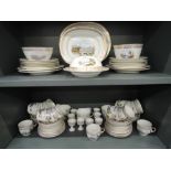 A selection of Victorian gilt heightened tea and dinnerware having pictorial landscape decoration