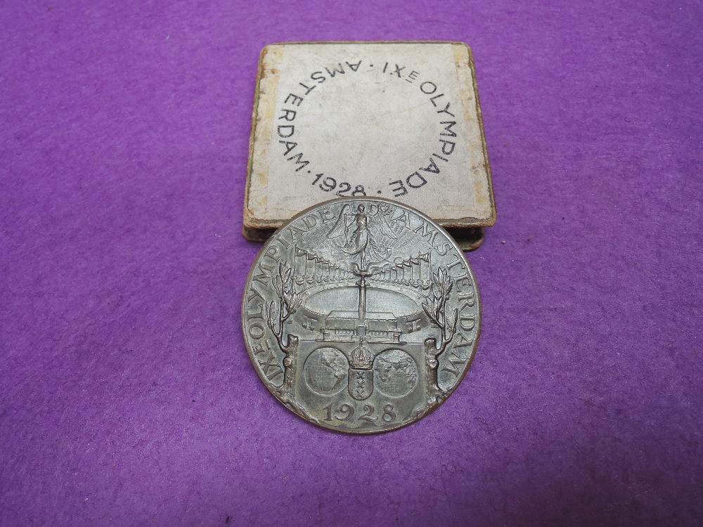 A 1928 Amsterdam Olympic games participation medal, in bronze designed by J C Wienecke, with - Image 2 of 2