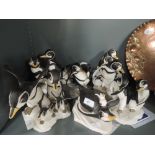 A selection of ceramic figures by the Franklin Mint all penguin themed