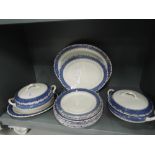 A part dinner service by Burleigh Ware including tureen and chargers