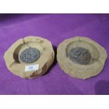 A pair of vintage ashtrays made from the stones of houses of parliament