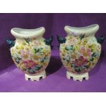 A pair of vintage antique style mantle vase