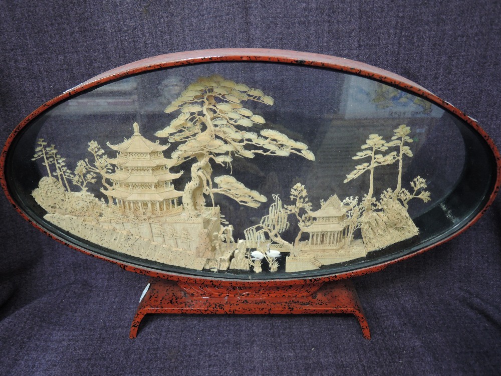 A vintage Japanese cork diorama landscape in oval frame