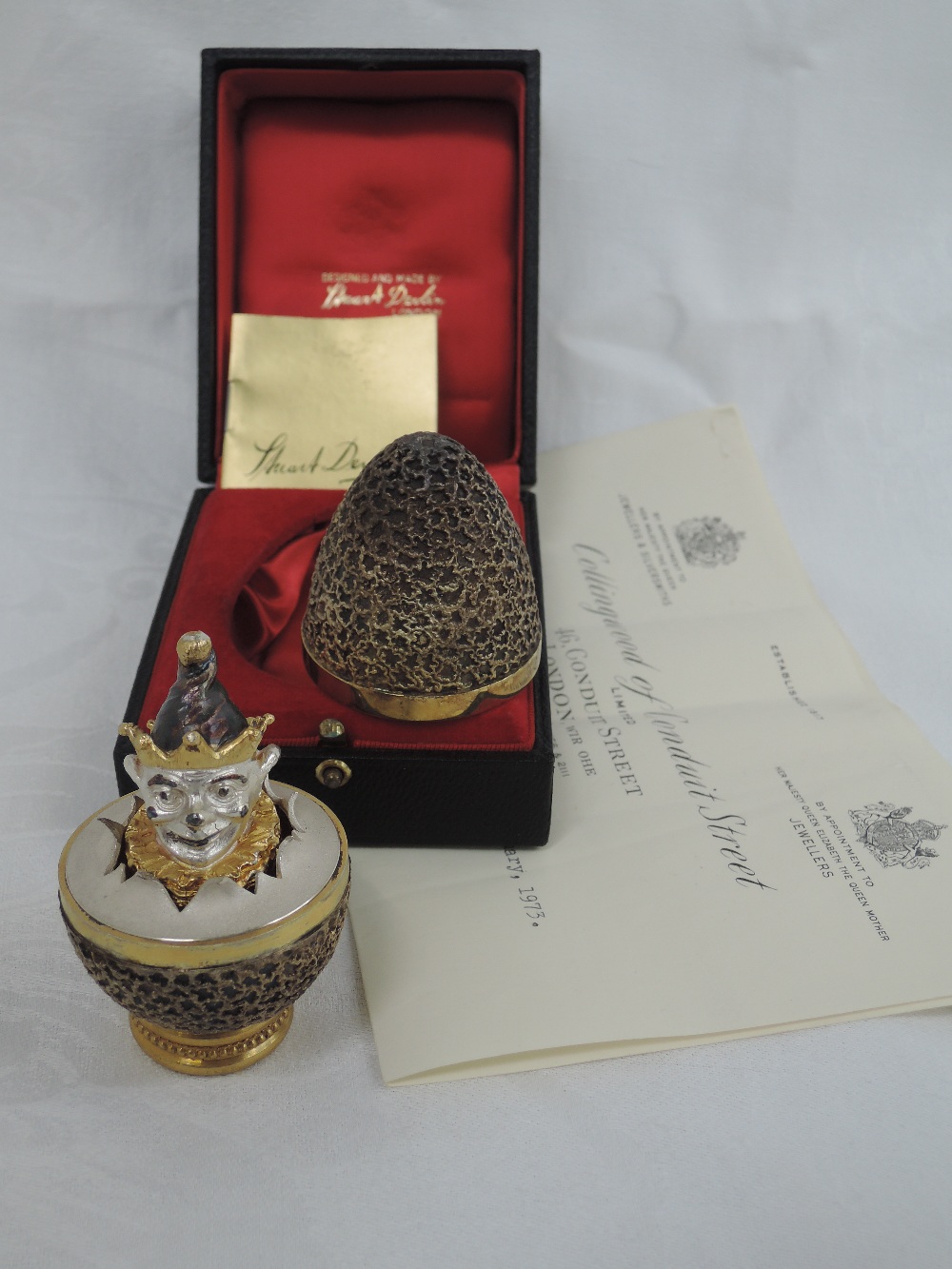 A cased Stuart Devlin 1973 silver gilt limited edition surprise Easter egg having a textured - Image 2 of 2