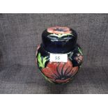 A Moorcroft ginger jar in the Anenome pattern on blue ground, by Emma Bossons, numbered 34/94, in